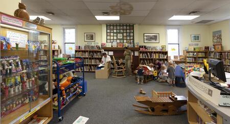 A charming one-room library, it is Montgomery County's oldest, and is now an historic landmark surrounded by old trees and turreted Victorian homes.